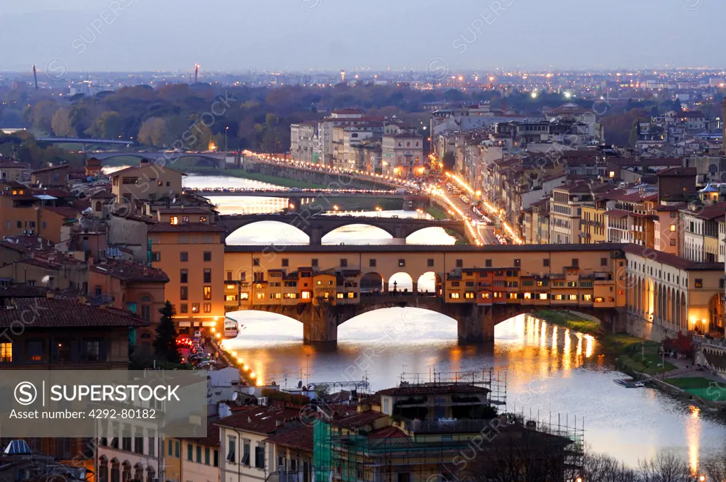 Italy, Tuscany, Ponte Vecchio over Arno River in Florence at dusk