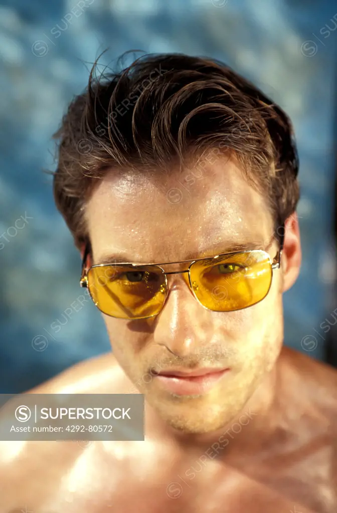 Man with yellow sunglasses