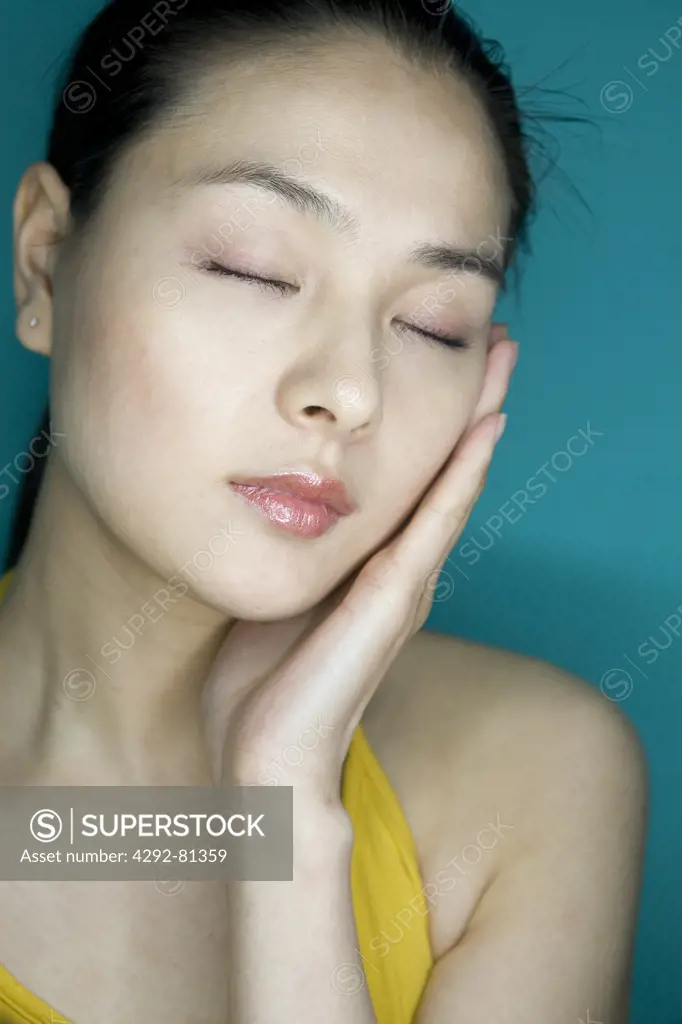 Woman with eyes closed