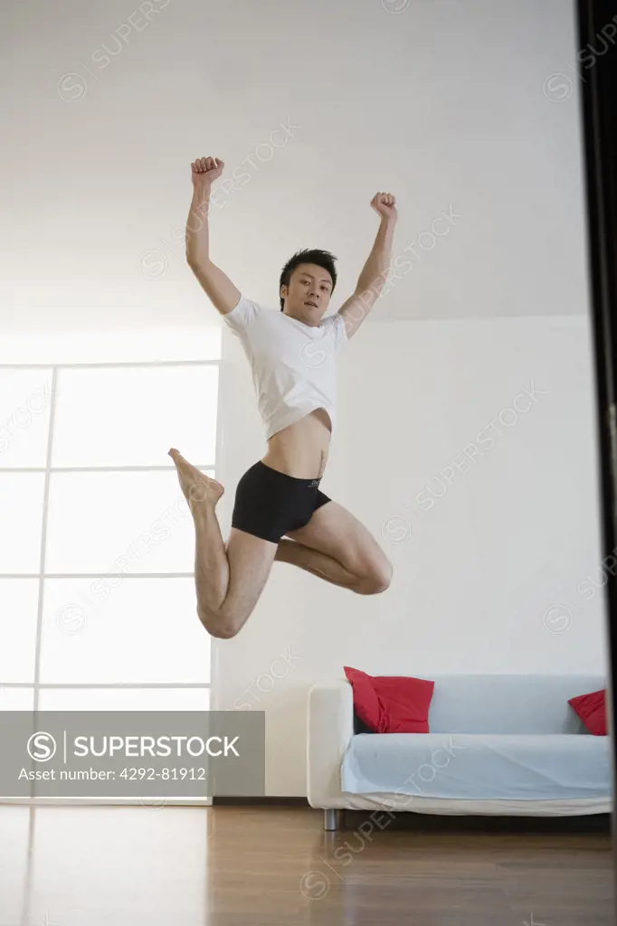 Asian man exercising