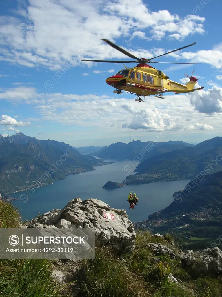 Italy, Lombardy, Lake Como, an helicopter rescues operation over Monte Grona