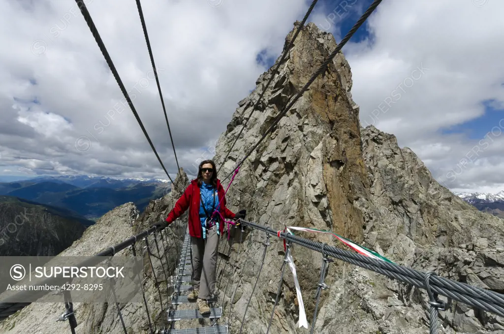 Italy, Retiche Alps, Lagoscuro Mountain Chain, Rope Bridge the Via Ferrata Sentiero dei Fiori