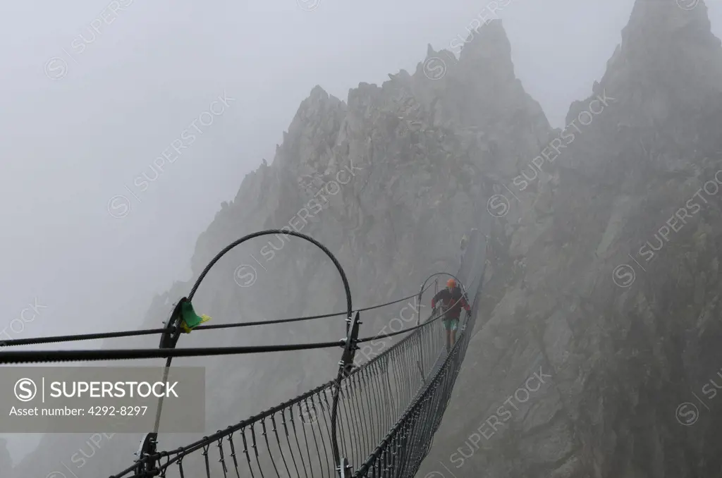Italy, Retiche Alps, Lagoscuro Mountain Chain, Rope Bridge the Via Ferrata Sentiero dei Fiori