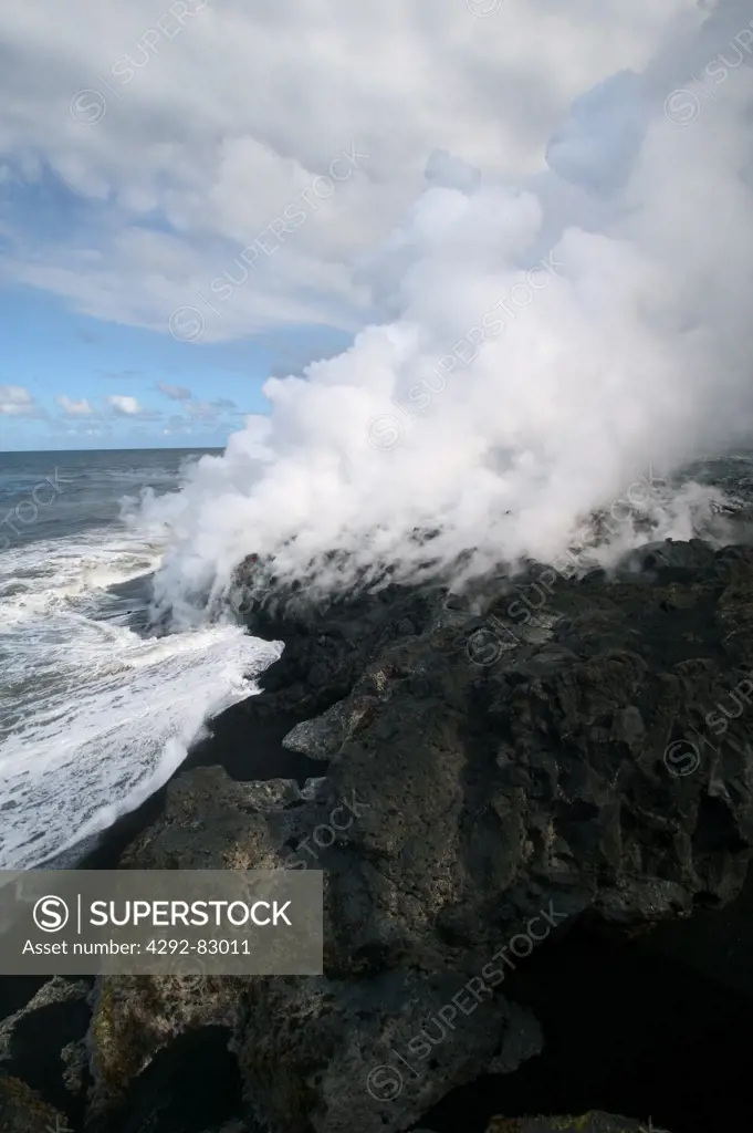 Piton de la Fournaise erupting Volcano in Reunion Island, lava entering the sea