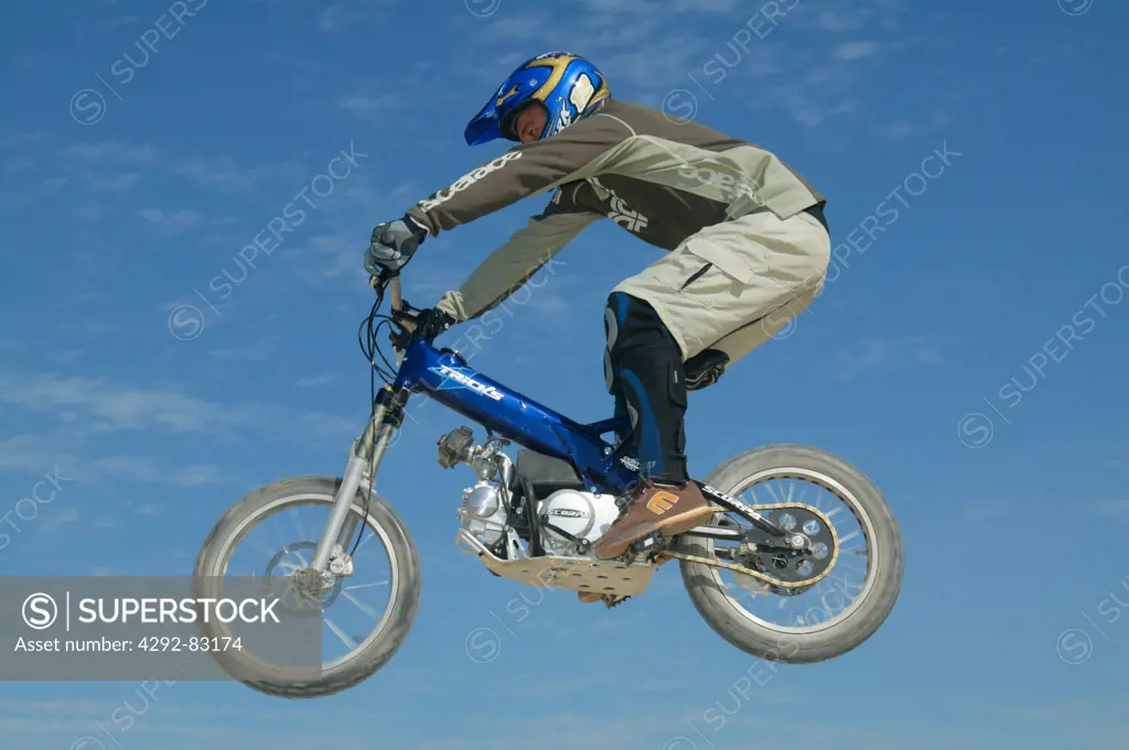 Motorcrosser jumping