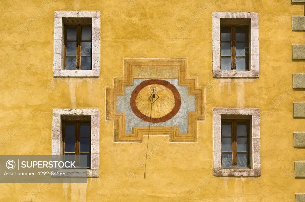 France, Rhone Alpes, Hautes Alpes, Briancon, yellow house facade, sundial