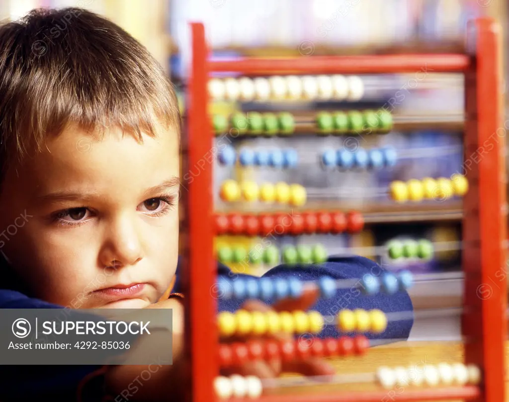 Child with abacus
