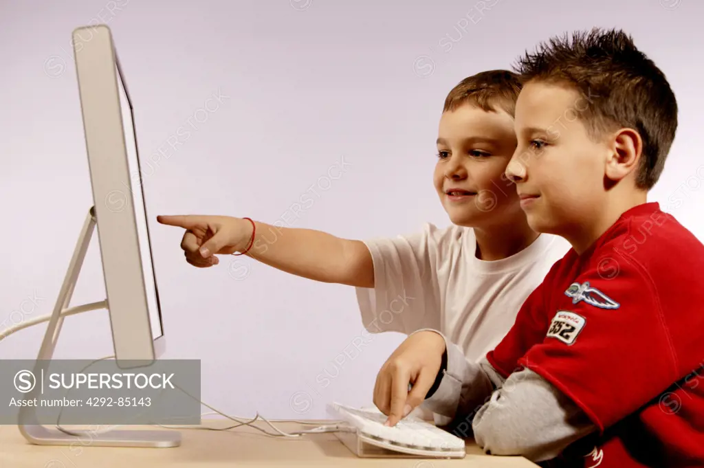 Boys using computer