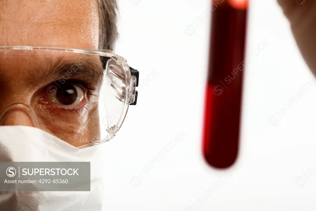 Laboratory technician holding a blood sample