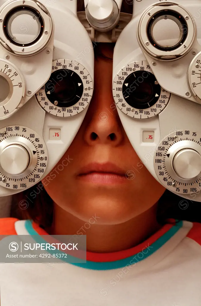 Boy having eye test