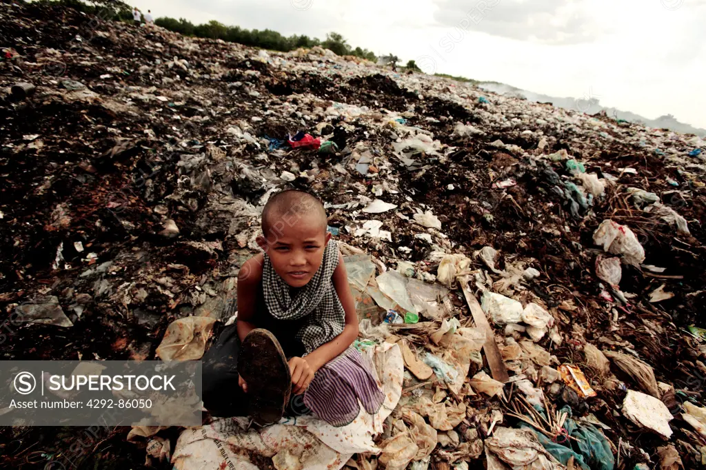 Cambodia, boy in dump