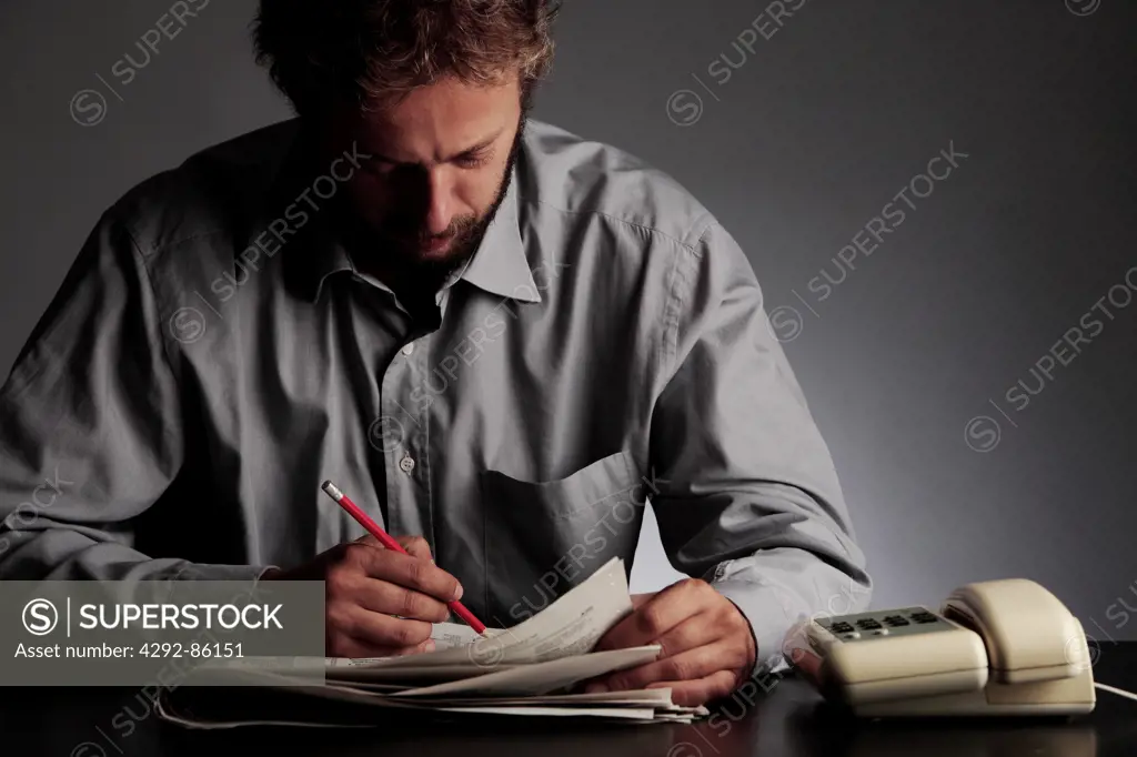 Man reading job listing