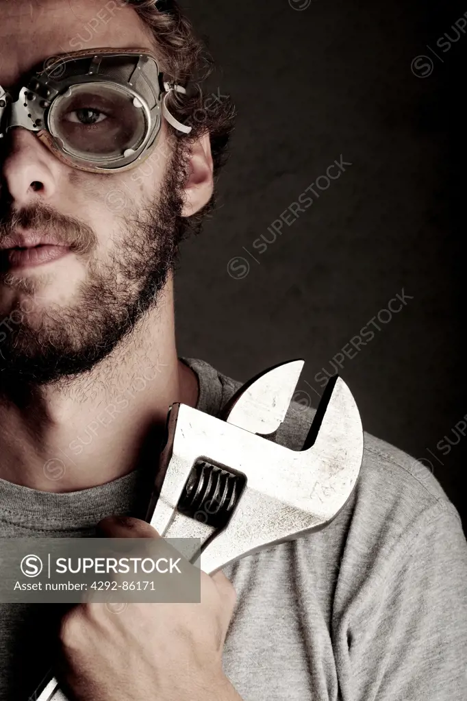 Portrait of manual worker with wrench