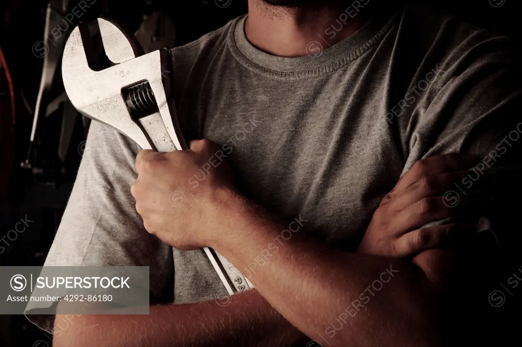 Portrait of manual worker with wrench