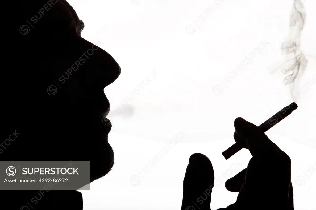 Man profile smoking cigarette