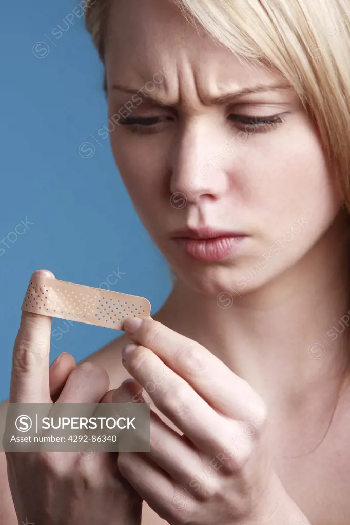 Young woman with bandage