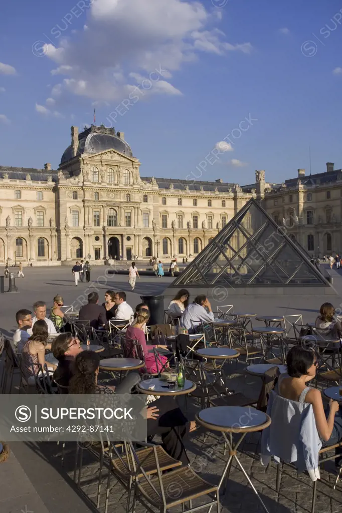 France, Île-de-France, Paris, The Louvre, Pyramid and bar with tourists
