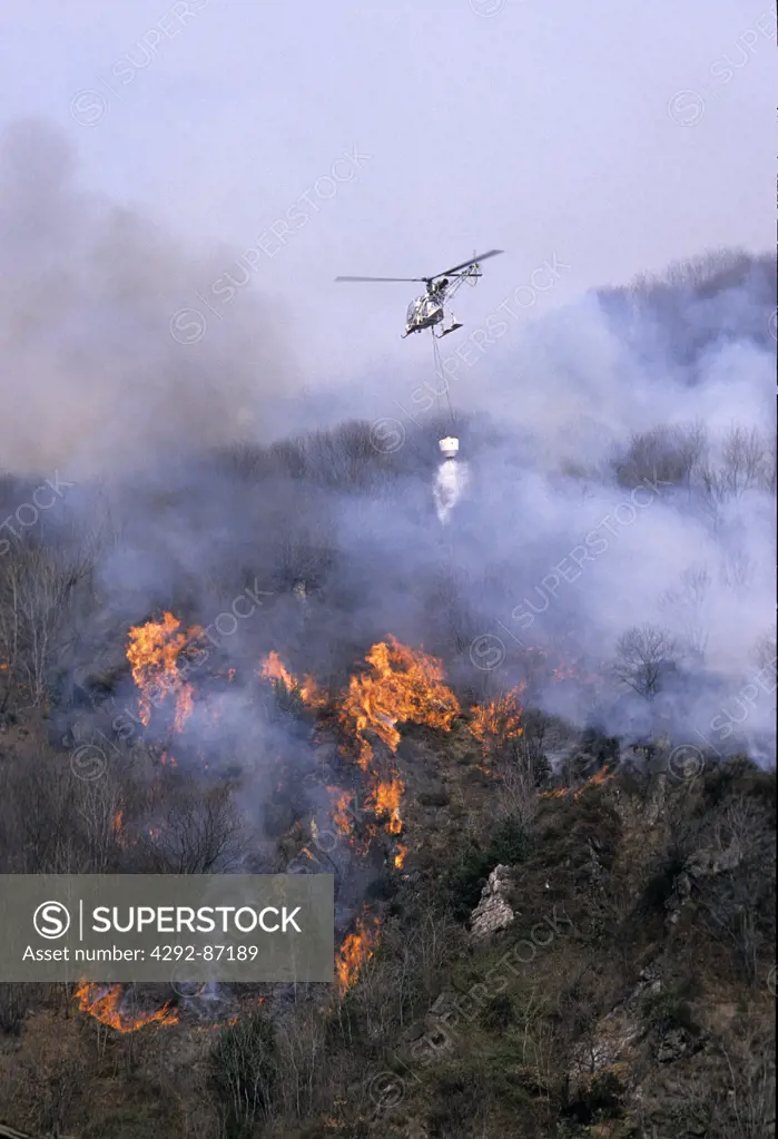 Helicopter extinguishing a fire