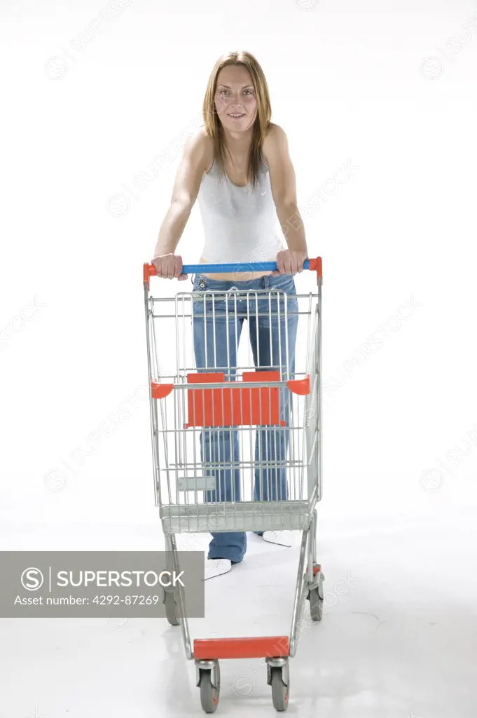 Woman's portrait with shopping trolley