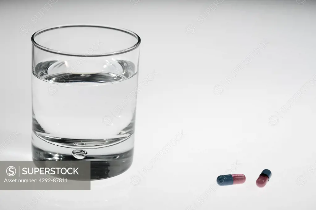 Pills and glass of water