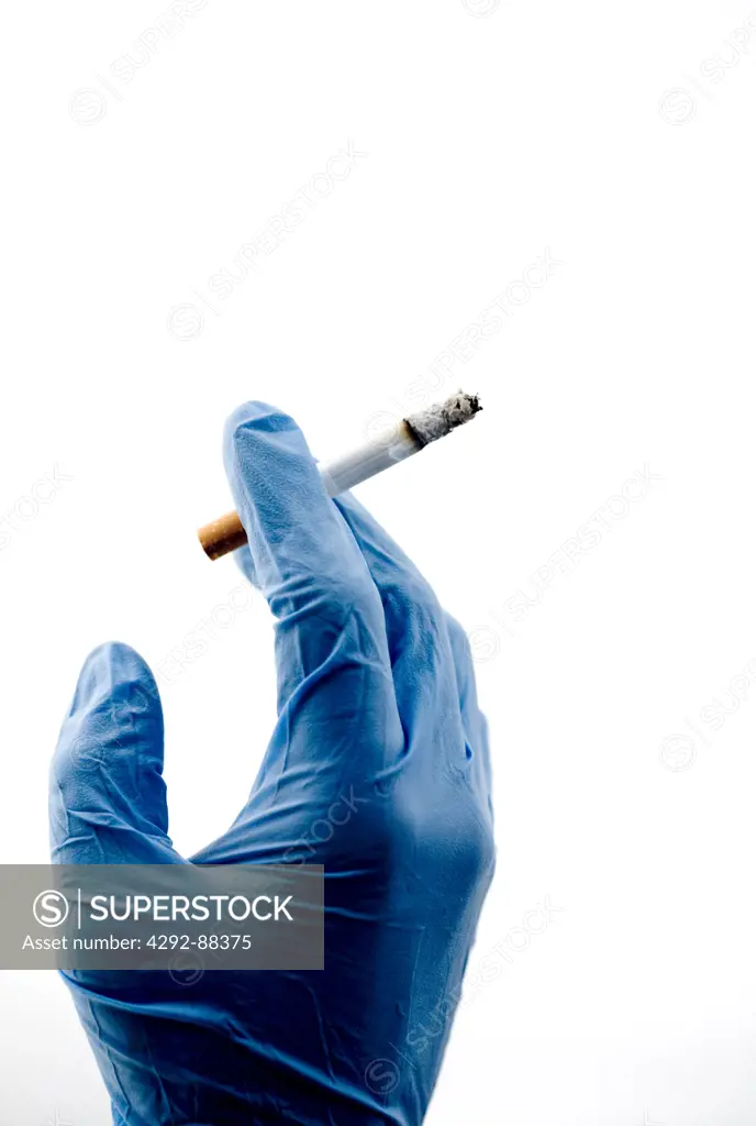 Hand holding cigarette