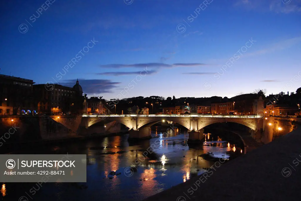Italy, Lazio, Rome, Bridge river Tiber at dusk