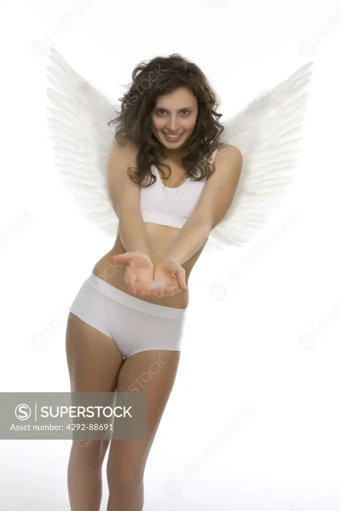 Young woman wearing wings