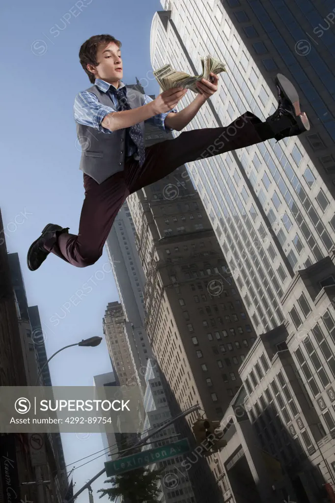USA, New York City, tenneager jumping