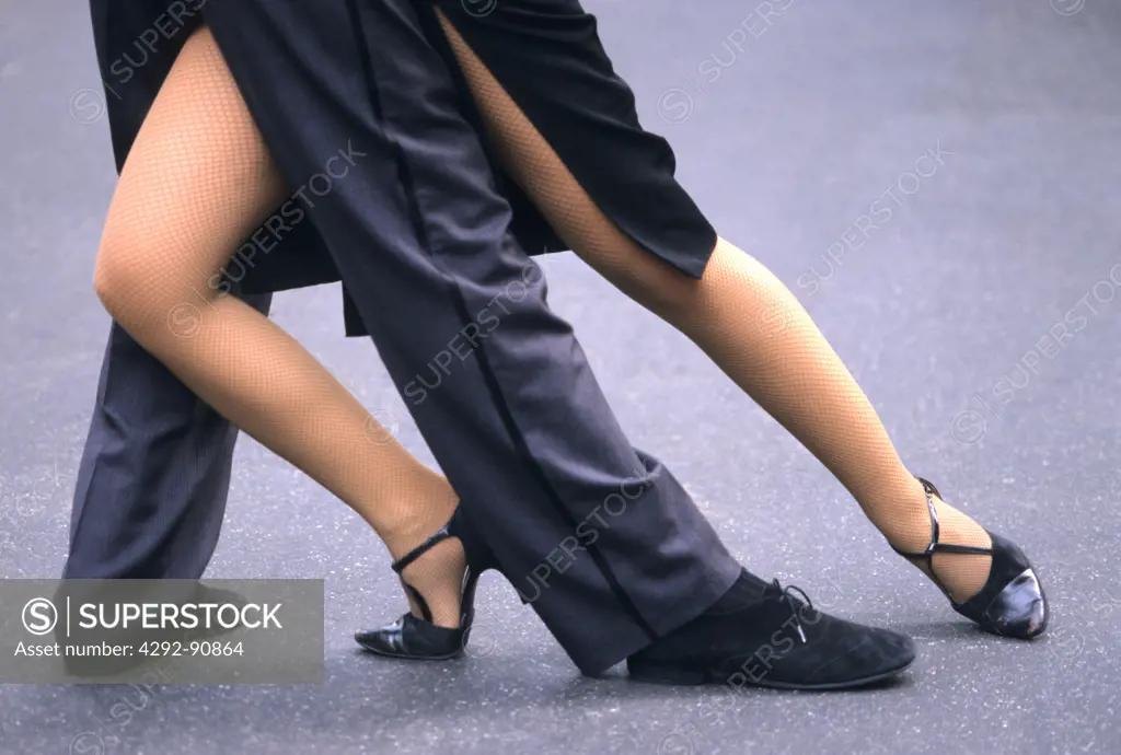 Argentina, Buenos Aires, couple performing Tango, low section