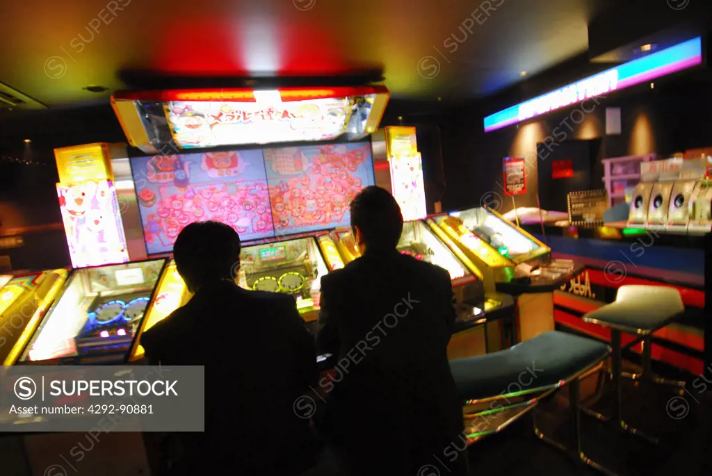 Japan, Tokyo, businessman in gaming room