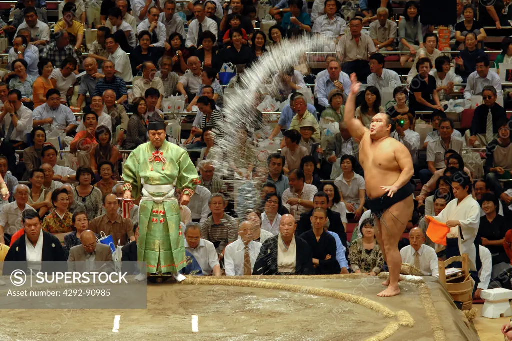 Japan, Tokyo, pre fight sumo wrestling ceremony of tossing salt into ring
