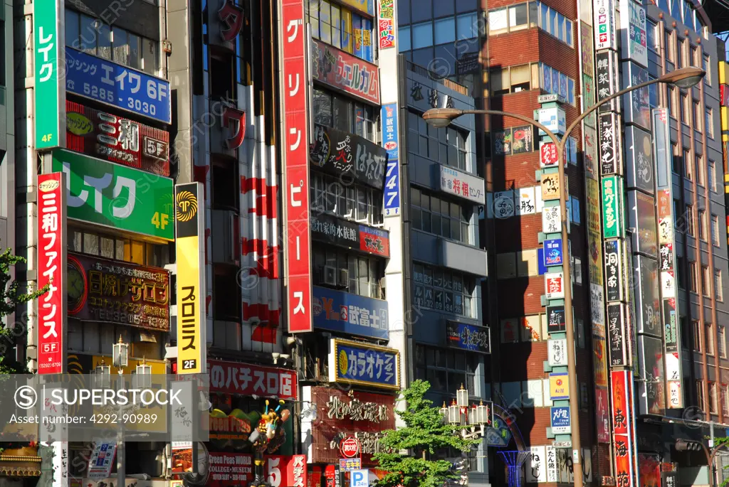 Japan, Tokyo, shop signs on buildings