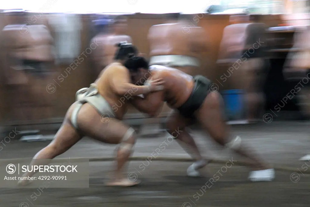 Japan, Tokyo, two Sumo Wrestlers training