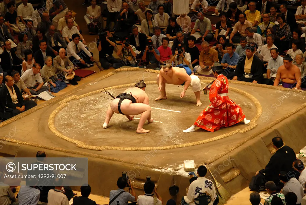 Japan, Tokyo, two Sumo wrestlers during competition