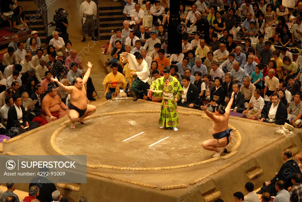 Japan, Tokyo, two Sumo wrestlers during competition