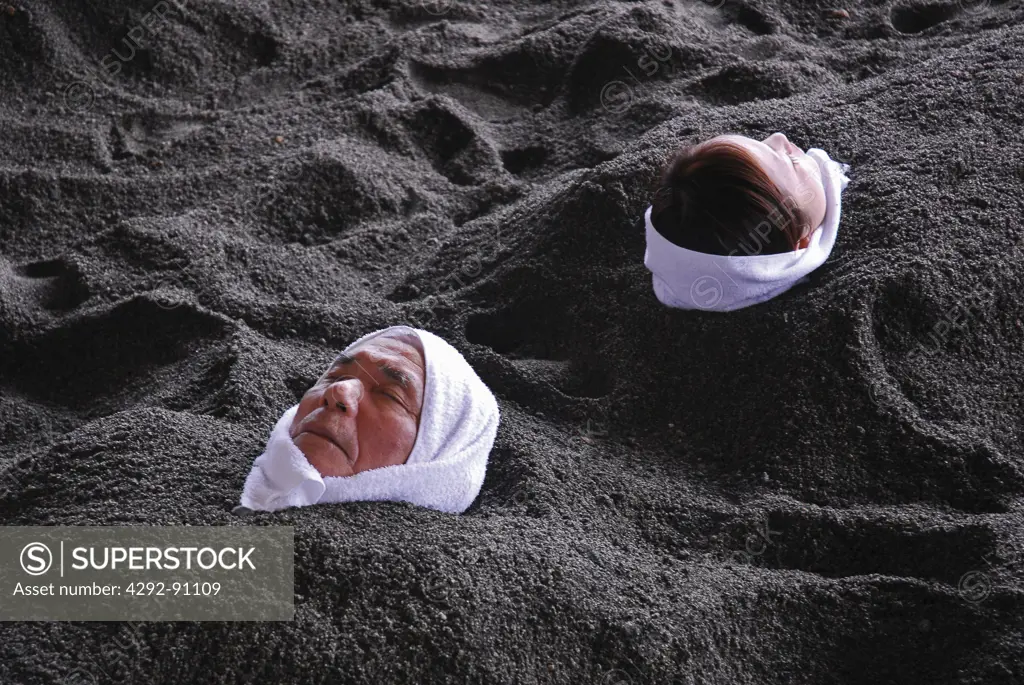 Japan, Kyushu, Kagoshima, people taking natural Sand Bathing at Ibusuki Spa
