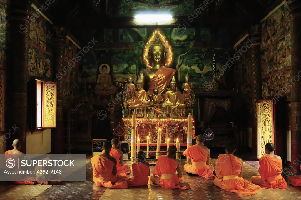 Asia, Laos, Luang Prabang, Buddhist monks in temple