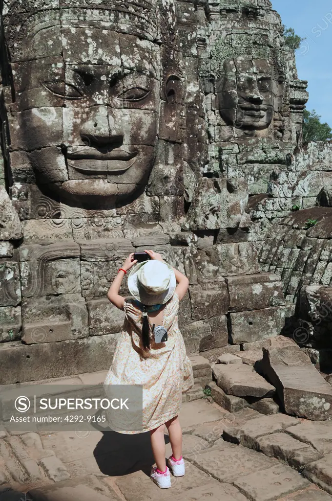 Asia, Cambodia, Siem Reap, Angkor Wat, carved stone statues at Bayon temple in Angkor Thom complex