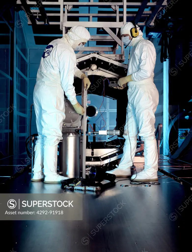 People working in aerospace industry control in sterile hall