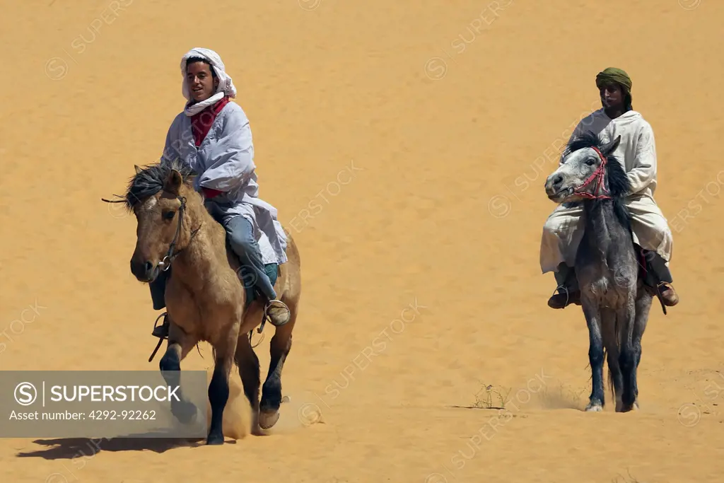 Africa, Algeria, Saoura area, Sahara desert, Tuaregs horseback riding