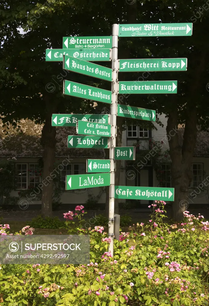 Germany, Schleswig-Holstein, Hallingen, Fohr island, Nieblum city. Direction Signs on a Street
