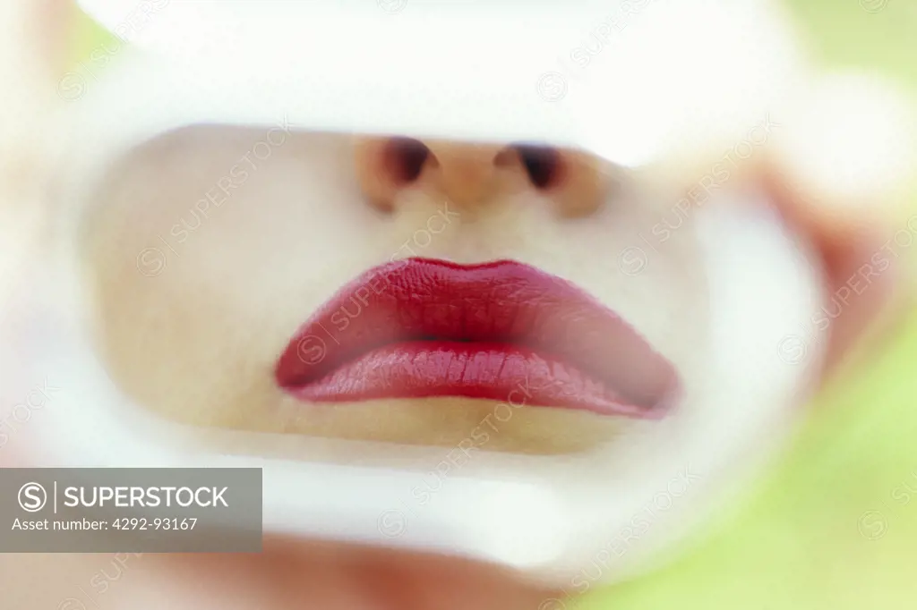 Woman's mouth reflected mirror