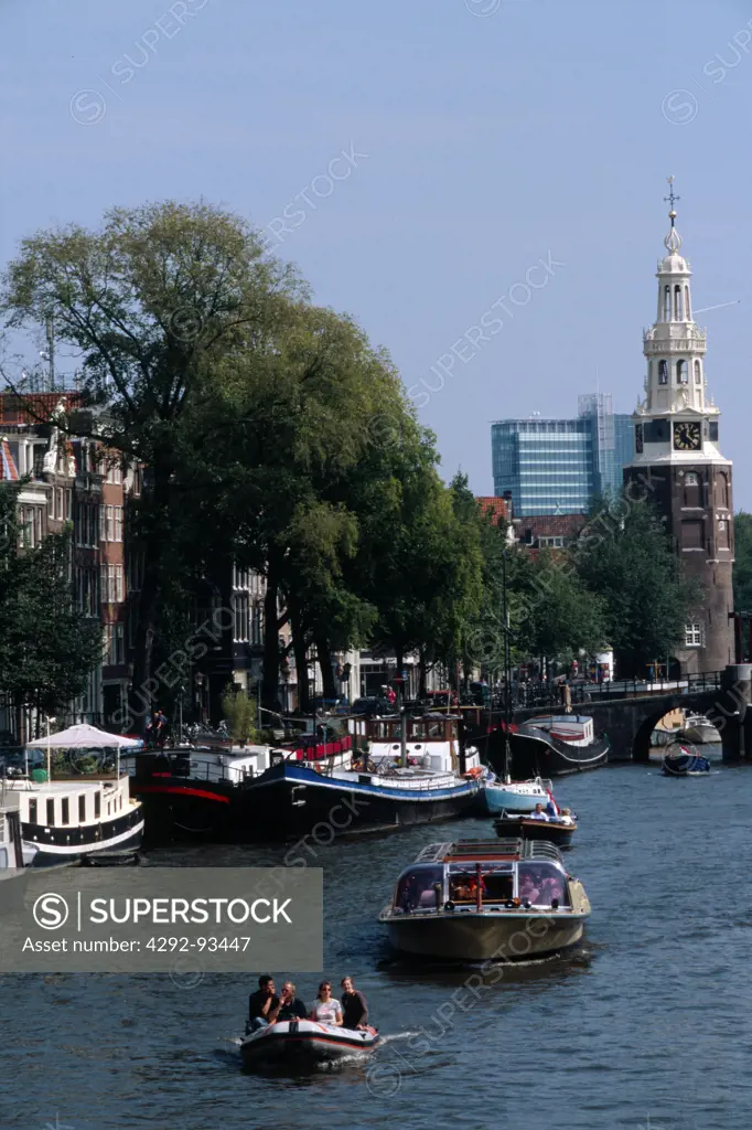 Netherlands, Amsterdam, Montelbaanstoren tower, Tourist boat