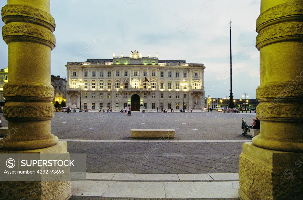 Italy, Friuli Venezia Giulia, Trieste, Piazza d'Italia Square, Lloyd Adriatico Palace at Dusk.