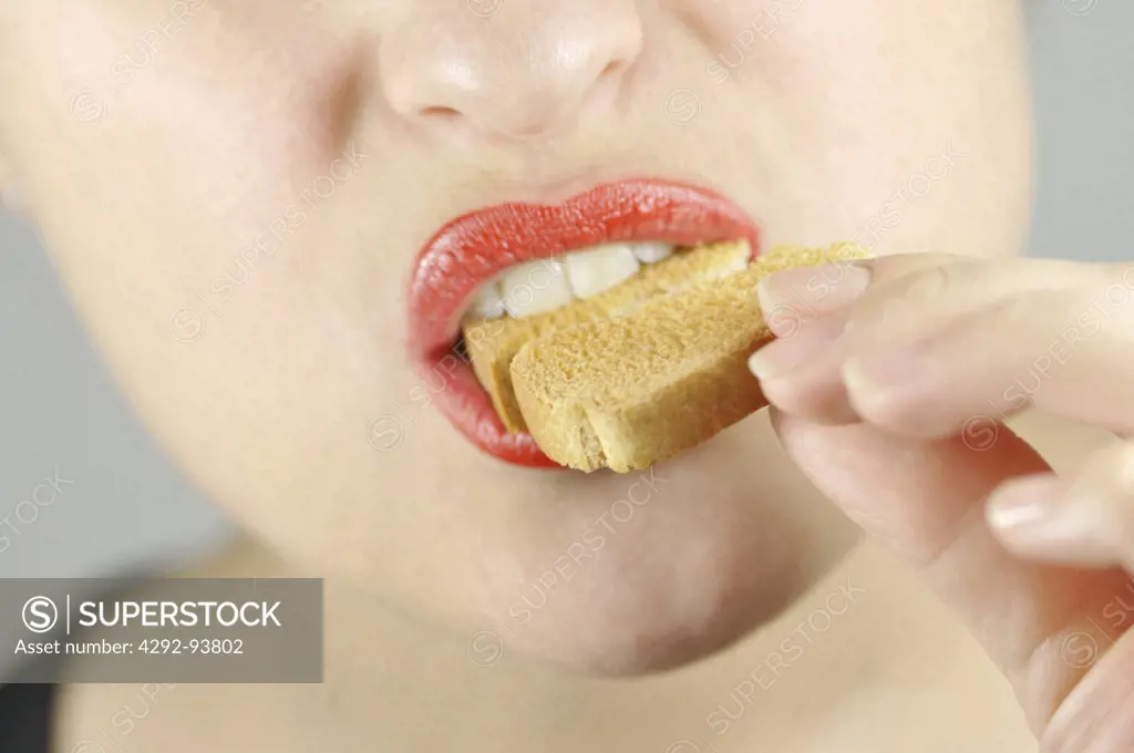 Woman Eating Biscuit Rusks