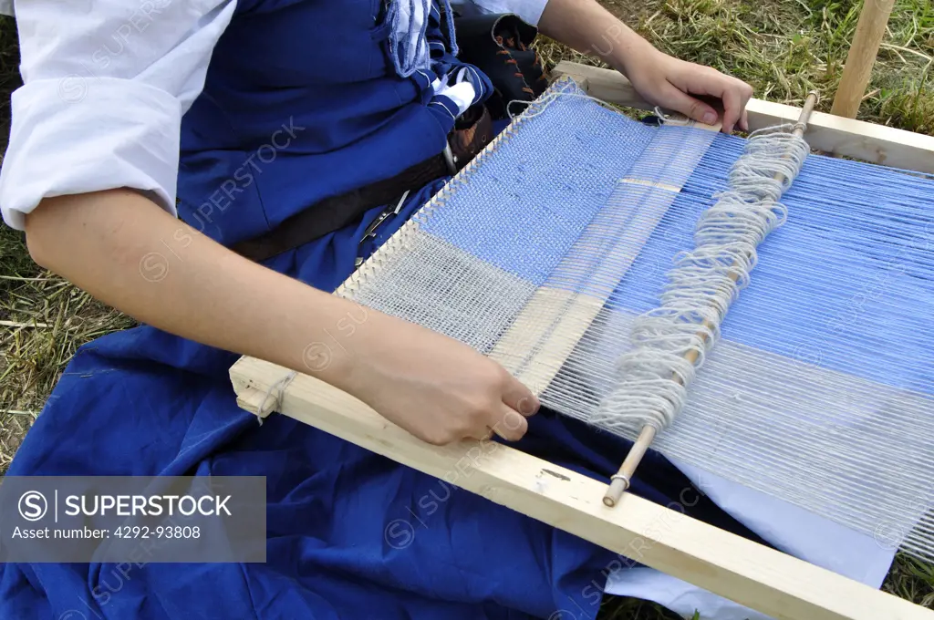 Italy, Lombardy, Historical Recalling, Woman Using Hand Loom
