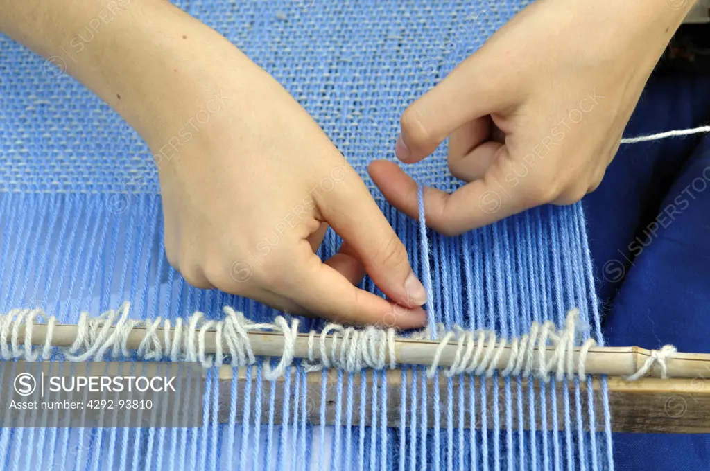 Italy, Lombardy, Historical Recalling, Woman Using Hand Loom