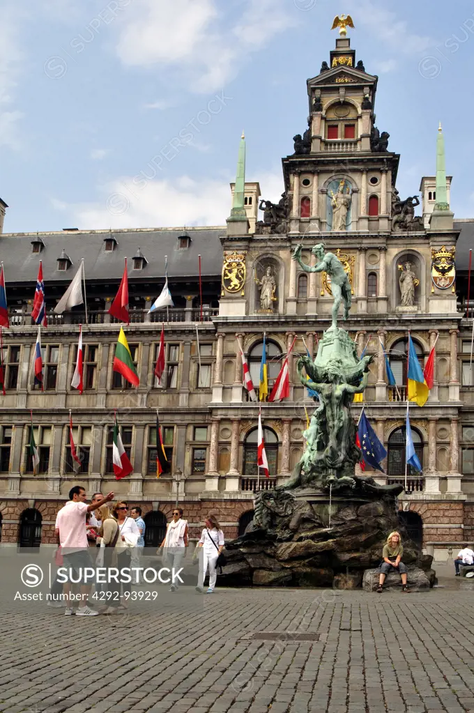 Belgium, Antwerp. Grote Markt, Brabo Fountain background City Hall
