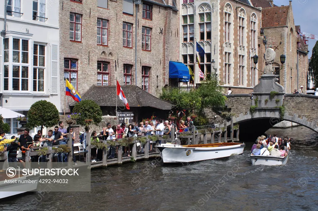 Belgium, Bruges, Tourists Boat on Canal