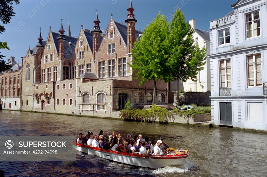 Belgium, Bruges, Tourists Boat on Canal